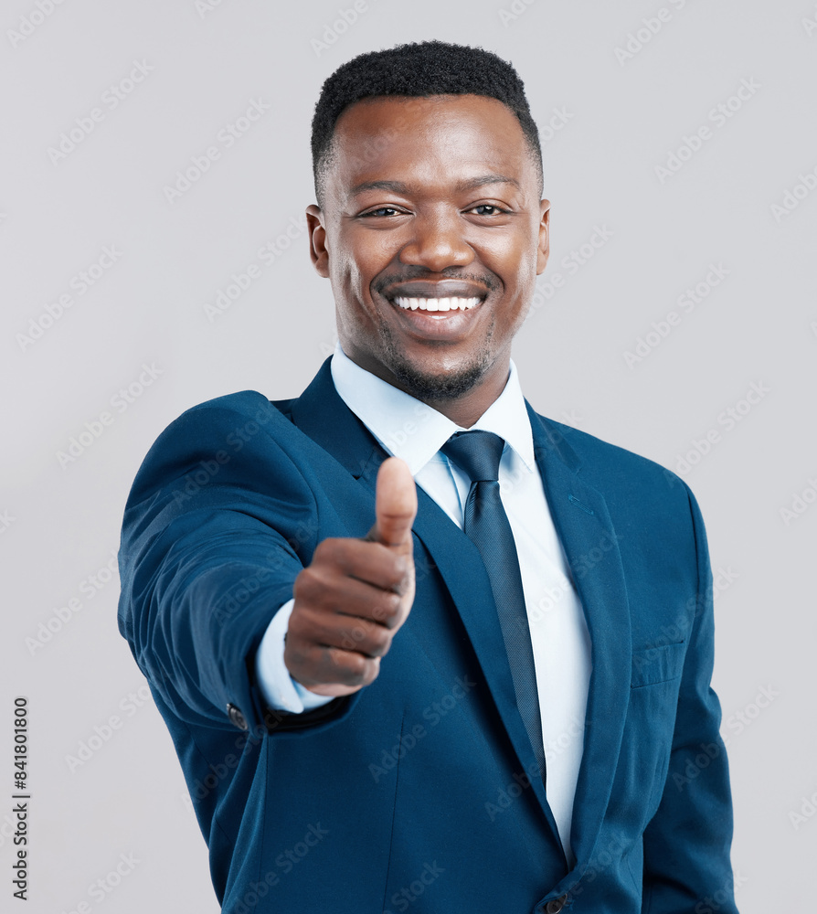 Business, portrait and black man with thumbs up in studio for support, motivation and praise on grey background. Success, face and entrepreneur with OK hand emoji for winning, vote and feedback sign Business, portrait and black man with thumbs up in studio for support, motivation and praise on grey background. Success, face and entrepreneur with OK hand emoji for winning, vote and feedback sign