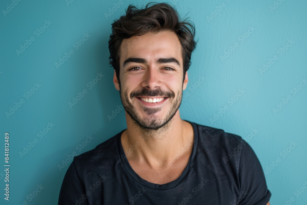 Obraz premium A close up portrait of a young man with a subtle smile