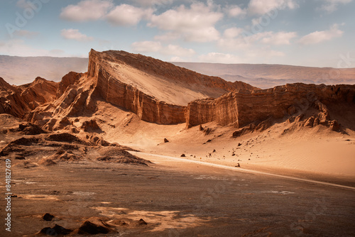 The Amphitheater, a huge red rock protruding from the earth in the middle of Moon Valley (Valle de la Luna), San Pedro de Atacama, Chile.