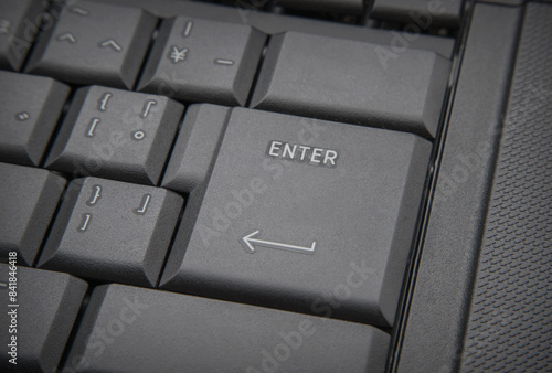 "enter" key of computer keyboard in close up