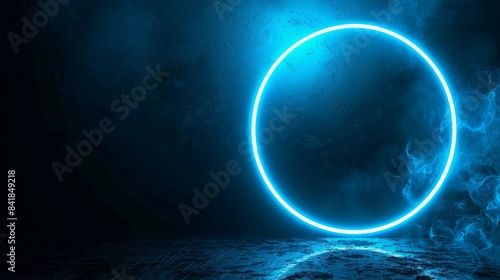 A glowing neon blue circle shines brightly against a dark  smoky backdrop  creating a futuristic and ethereal atmosphere