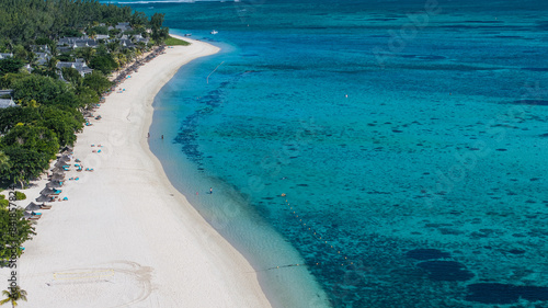 Pointe Sud Ouest, aerial landscape view of wide white sand beach area with lagoon located at famous Le Morne Brabant Kite surf beach in southwest Mauritius 