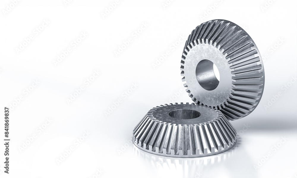 Two shiny metal gears interlocking Two shiny metal gears interlocking