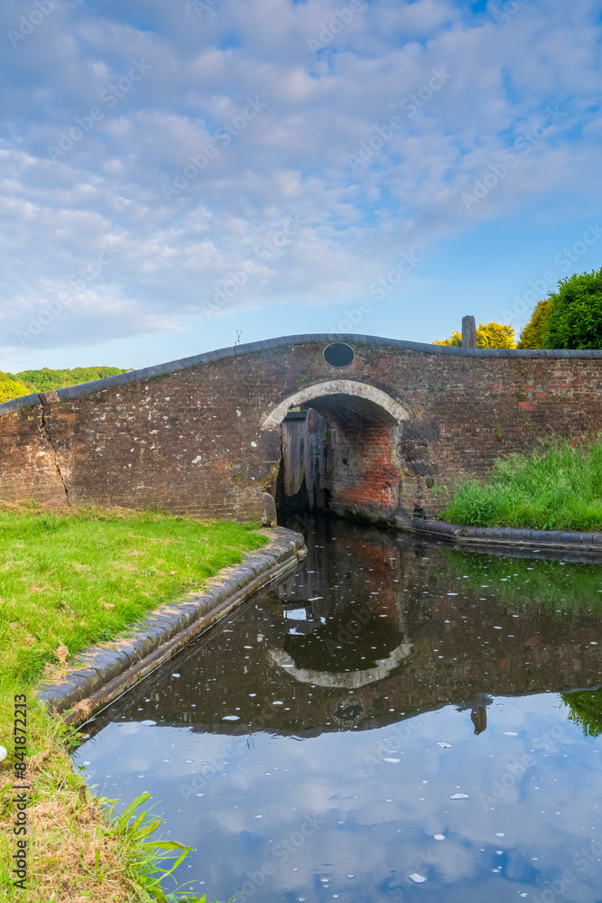 Canal bridge on a Spring morning in portrait orientation Canal bridge on a Spring morning in portrait orientation