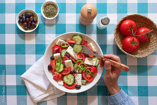 Healthy Greek salad with fresh vegetables and feta cheese photo