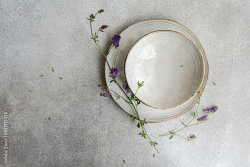 Minimalist summer table setting with wildflowers photo