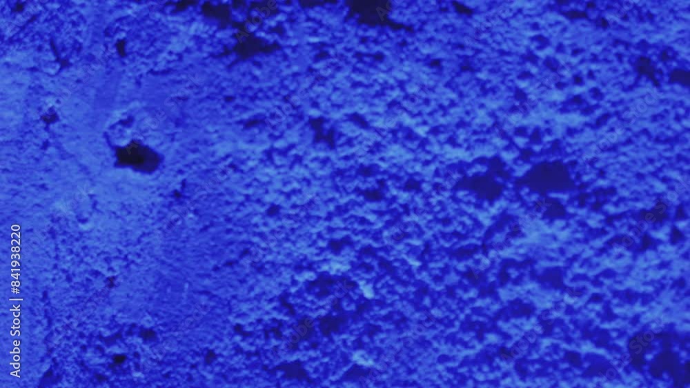 Detailed closeup image of a blue textured surface with abstract design elements Detailed closeup image of a blue textured surface with abstract design elements