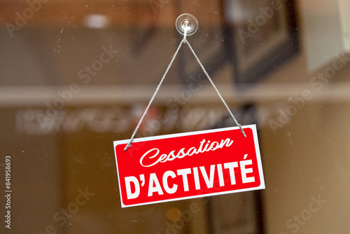 Photos Cessation of activity sign written in French