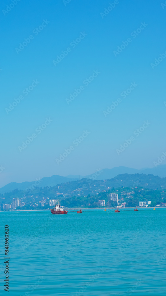 atumi seaport with stunning sea and mountain views, perfect for a serene escape. atumi seaport with stunning sea and mountain views, perfect for a serene escape.