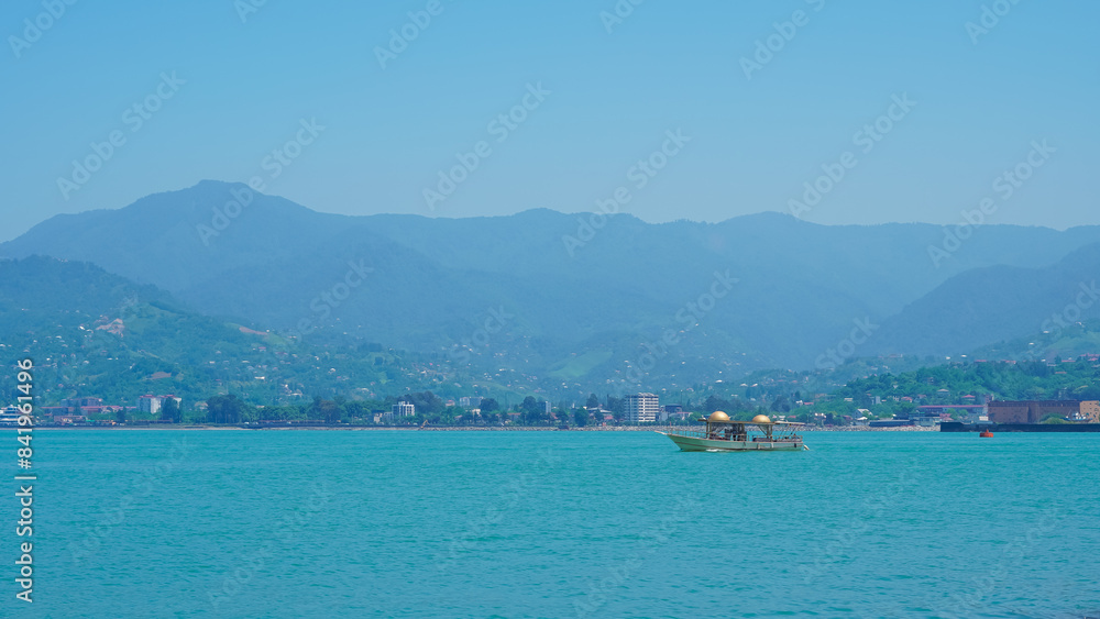 atumi seaport with stunning sea and mountain views, perfect for a serene escape. atumi seaport with stunning sea and mountain views, perfect for a serene escape.