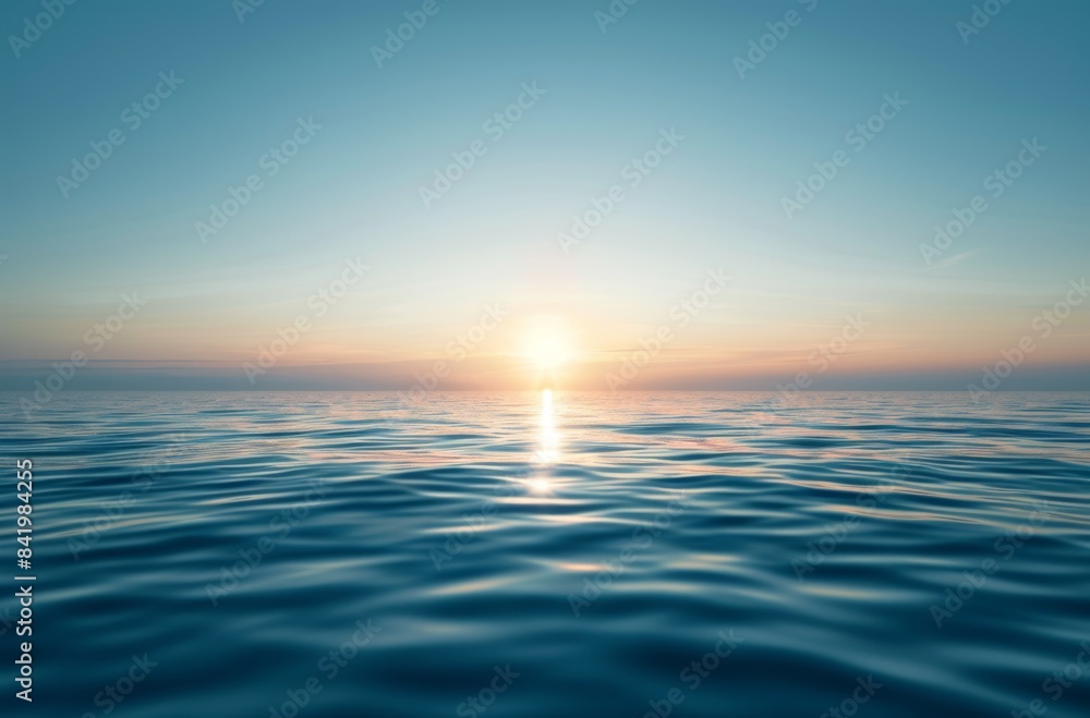 A serene sunrise over the calm sea A serene sunrise over the calm sea