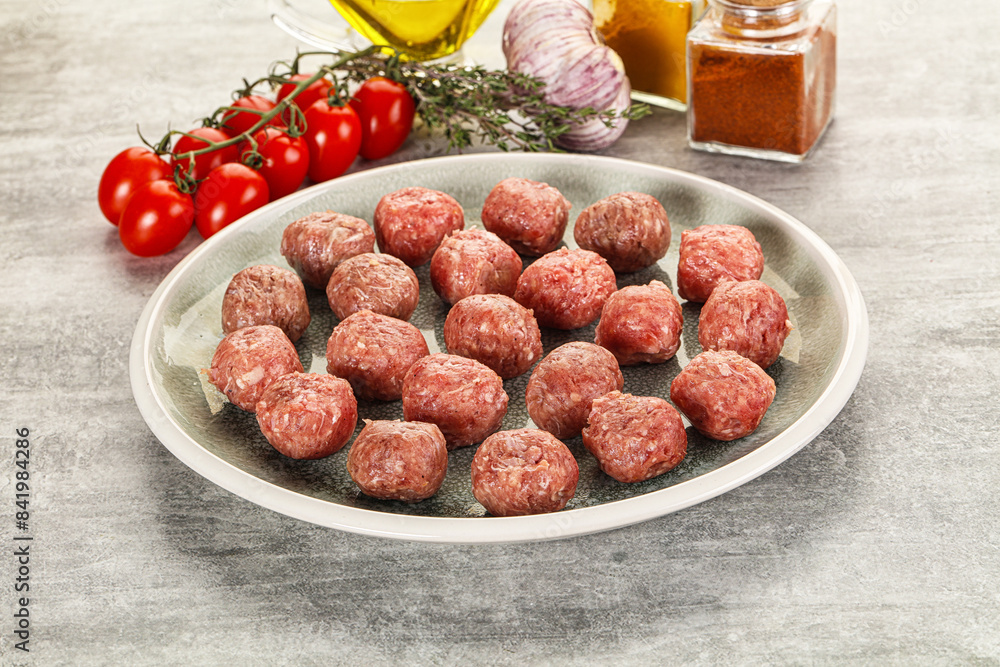Uncooked raw beef meatball minced Uncooked raw beef meatball minced