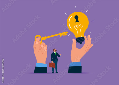 Wind up bulb. Invent new product. Unlock new business idea. Hand holding golden key about to insert into key hold on light bulb idea lamp. 