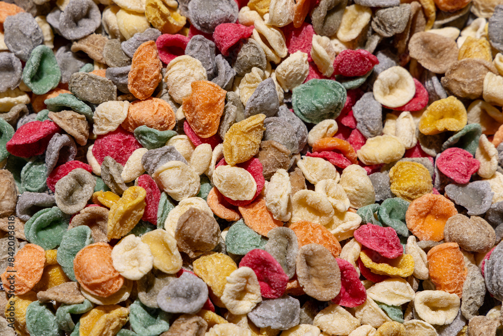 Colorful typical pasta known as orecchiette, handmade at street stands, Bari, Italy, Apulia