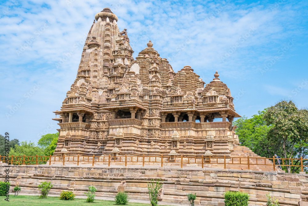 Ancient Hindu Temple in Khajuraho with Intricate Stone Carvings Ancient Hindu Temple in Khajuraho with Intricate Stone Carvings