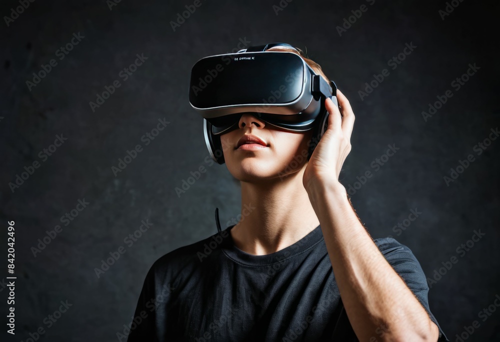 A person using a futuristic virtual reality headset A person using a futuristic virtual reality headset