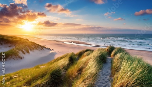 beautiful dunes beach at sunset north sea germany photo