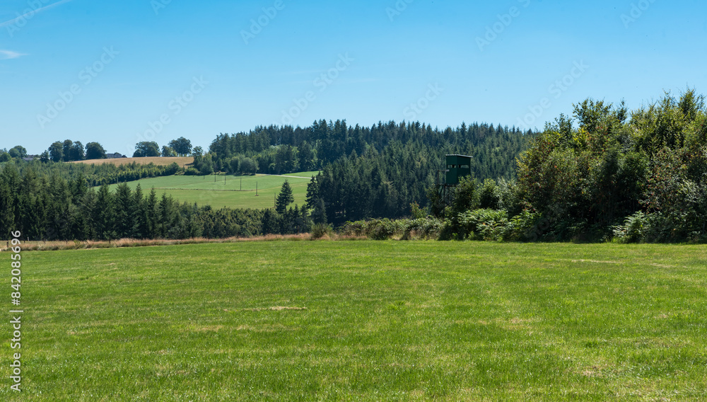 Panoramic view over the agriculture fields and meadows of the East-Belgian countryside near Burg-Reuland Panoramic view over the agriculture fields and meadows of the East-Belgian countryside near Burg-Reuland