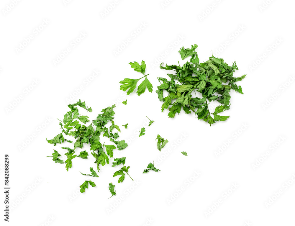 Dry parsley pile isolated. Crushed cilantro leaves heap, dried garden parsley, chervil flakes, corriender pileces Dry parsley pile isolated. Crushed cilantro leaves heap, dried garden parsley, chervil flakes, corriender pileces