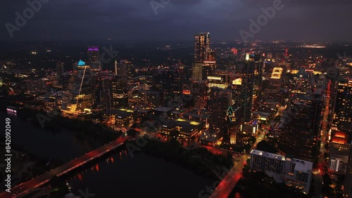 Wallpaper Mural Nightscape of Austin's downtown with glowing skyscrapers, city lights, and river reflections. Urban and cityscape concepts Torontodigital.ca