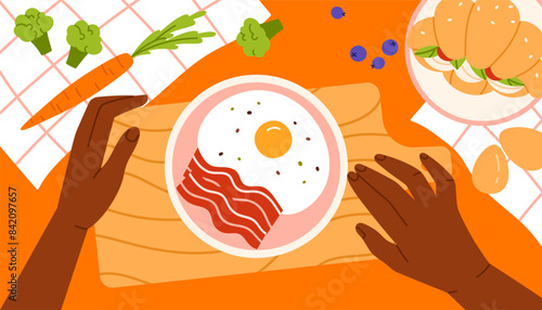 Hands cooking health breakfast food. Top view of cook process at home. Preparing dinner in kitchen with eggs, bacon, vegetable, croissant. Vector illustration in cartoon style
