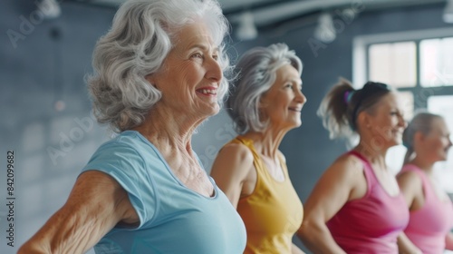 Senior Women Enjoying Group Fitness Class in Gym