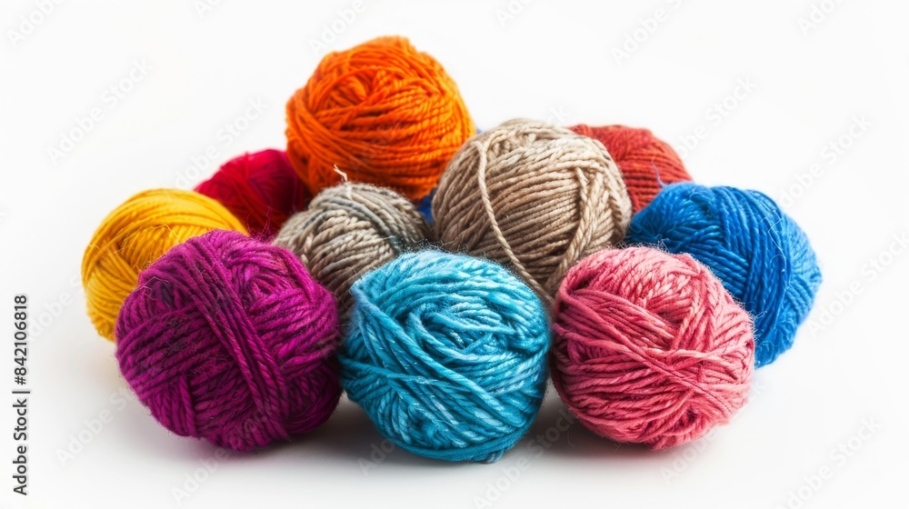 Colorful Yarn Balls Arranged in a Row on a White Background Colorful Yarn Balls Arranged in a Row on a White Background
