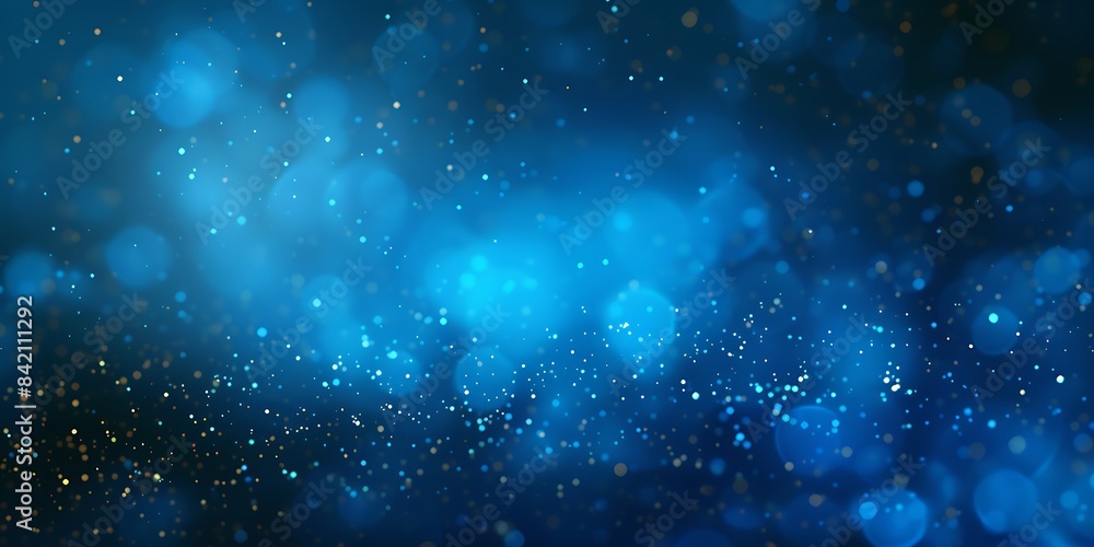 Fototapeta premium Blue shiny glowing glitter background. Dust, particles blue, cyan colored on dark background