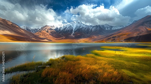 Breathtaking mountain landscape with dramatic clouds, reflective serene lake, and vibrant colors. Picturesque and perfect for nature themes, environmental projects,AI