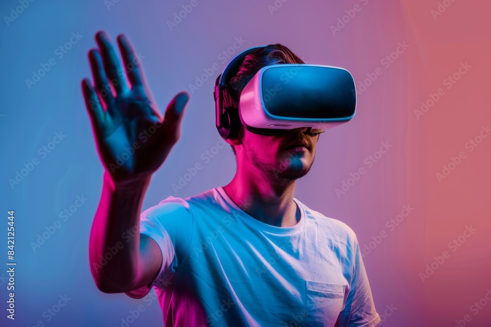 man in vr glasses, playing video games with virtual reality headset, trying to touch something with hand man in vr glasses, playing video games with virtual reality headset, trying to touch something with hand