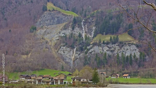 Waterfall in the mountains. Dundelbachfall waterfall near lake Lungernsee. Canton Obwalden, Switzerland photo