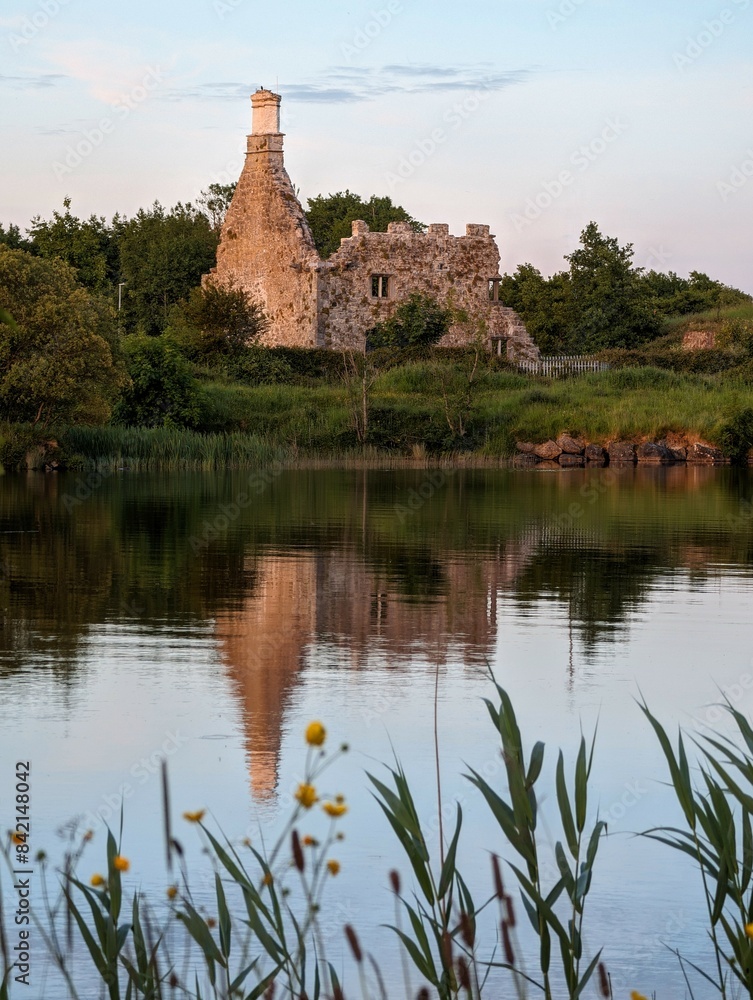 Terryland castle reflected in Corrib river at Galway city, Ireland, historical landmark background, wallpaper