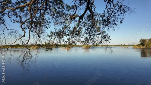 Zambezi River At Victoria Falls In Matabeleland North Zimbabwe. Giant Waterfalls. Nature Landscape. Victoria Falls At Matabeleland North Zimbabwe. Zambezi River. Travel Scenery. photo