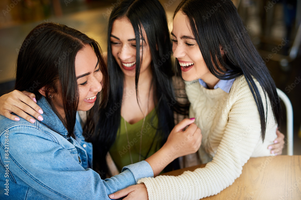 Women, friends and hug in coffee shop together with smile for bonding, love and relationship. Connection, happiness and joke or comedy in cafe with laugh, support and female students in New York Women, friends and hug in coffee shop together with smile for bonding, love and relationship. Connection, happiness and joke or comedy in cafe with laugh, support and female students in New York