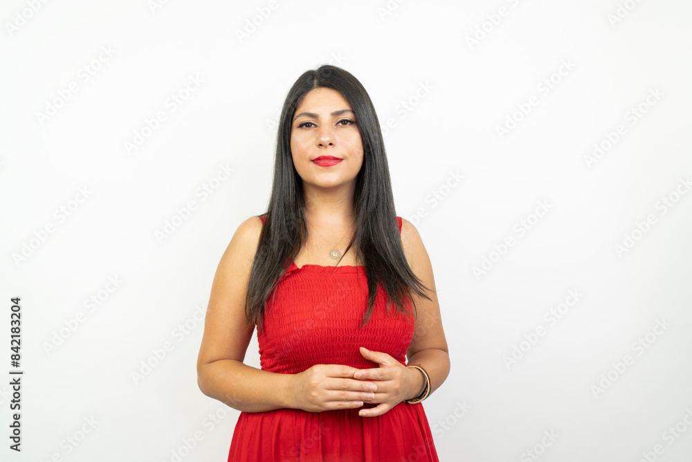 Portrait of a woman in a red dress on a white background Portrait of a woman in a red dress on a white background