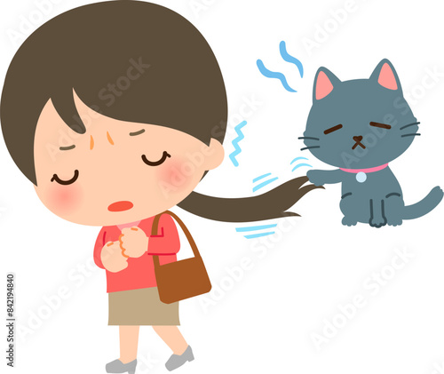 飼い猫に後ろ髪を引かれながら出かける女性