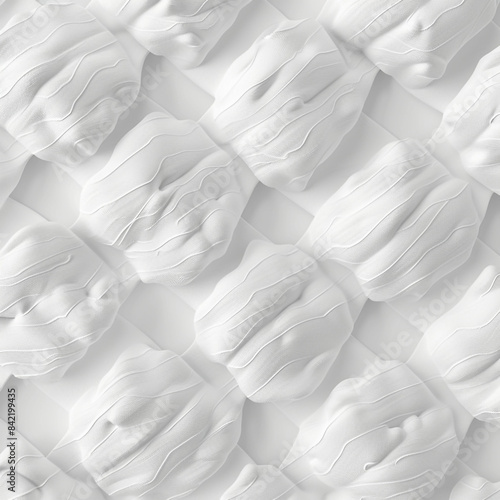 A gorgeous tapestry with plain white fibres in a cozy, quilted, puffed pocket abstract pattern