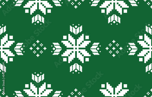 Christmas and New Year green and white seamless pattern, fairytale pixel pattern in white and green with Nordic snowflakes for winter hats, ugly sweaters, jumpers. wallpaper, paper or other design © ARMY