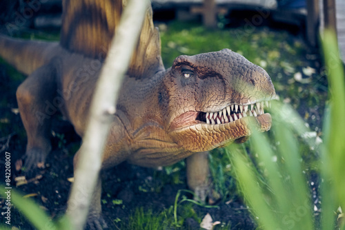 Dimetrodon is like a reptile, with curved hind legs and the lower part of the body pressed to the ground. With space to copy. High quality photo photo