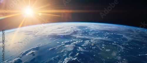 Earth from space, blue sky with sun in upper left corner, atmospheric perspective, dark background
