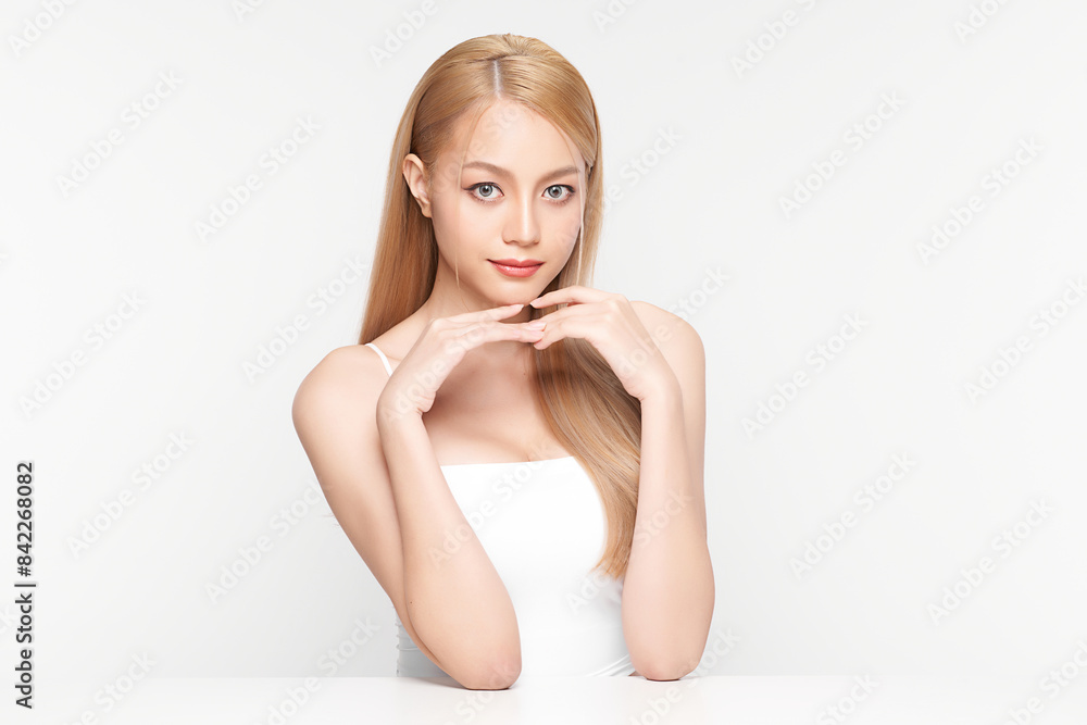 Obraz premium Beautiful young asian woman with clean fresh skin on white background, Face care, Facial treatment, Cosmetology, beauty and spa, Asian women portrait.