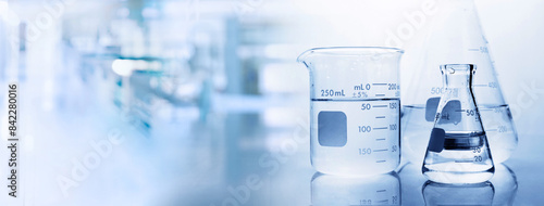 beaker and flask in chemistry science lab banner background
