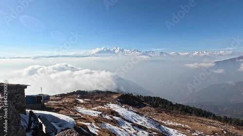 Breathtaking Ganesh Himal range with a snow-covered peaks. Time lapse of an ocean of clouds moving through the valley. View from  Lauribina, Nepal.  scenic Langtang and Gosaikunda , high Himalayan photo