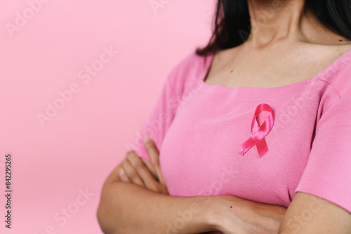 Wallpaper Mural Female In Pink T-Shirt With Pink Ribbon For Breast Cancer Awareness Keeping Arms Crossed Isolated On Pink Background Torontodigital.ca