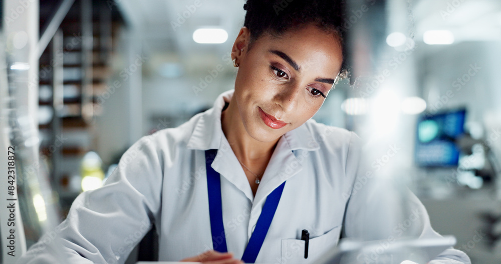 Woman, biologist and research with tablet for results, medical study or exam on new discovery at laboratory. Female person or scientist working on technology for online browsing or experiment at lab Woman, biologist and research with tablet for results, medical study or exam on new discovery at laboratory. Female person or scientist working on technology for online browsing or experiment at lab