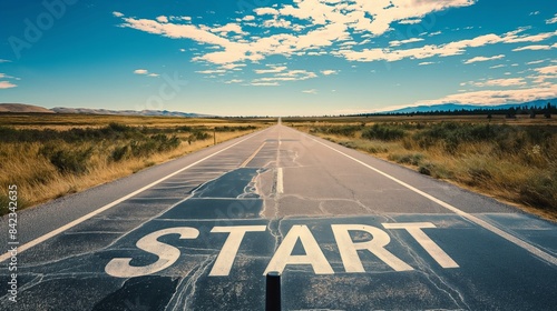 Wallpaper Mural The word START is painted on a road, signaling the beginning of a journey with scenic landscape in the background Torontodigital.ca