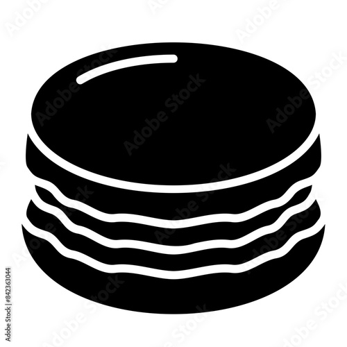 macaron glyph icon