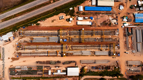 Aerial view of a cement bridge under construction. Road currently under construction at several levels to increase traffic