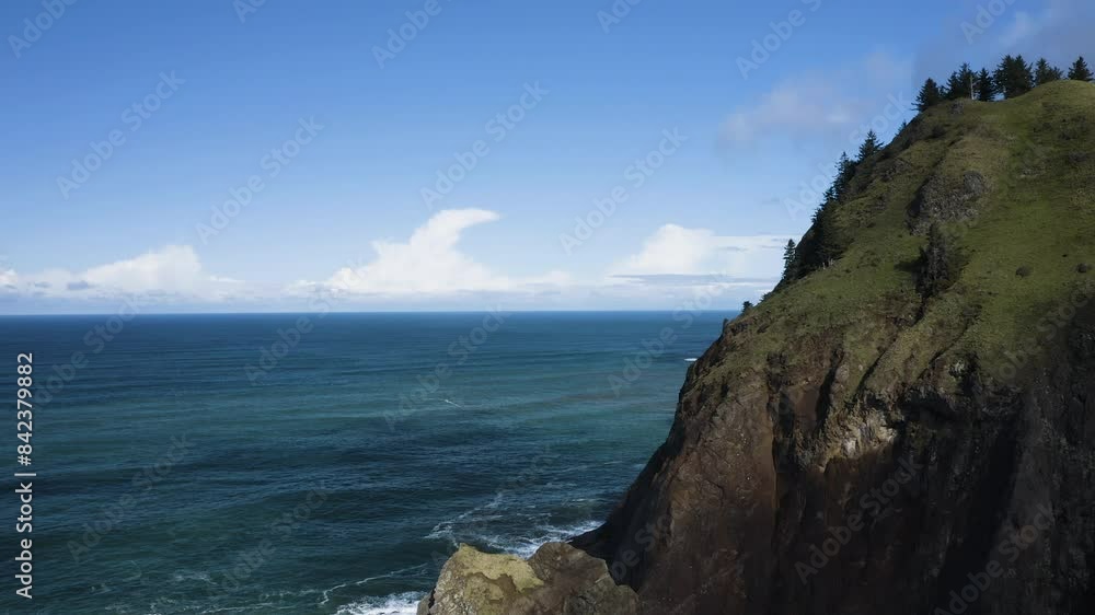 Aerial View Of Rocky Cliffs Along Oregon Coast With Turquoise Ocean and Skyline, God's Thumb USA Aerial View Of Rocky Cliffs Along Oregon Coast With Turquoise Ocean and Skyline, God's Thumb USA