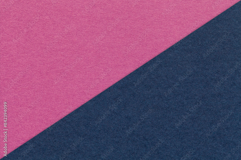 Texture of craft magenta and navy blue paper background, half two colors, macro. Vintage kraft purple cardboard. Texture of craft magenta and navy blue paper background, half two colors, macro. Vintage kraft purple cardboard.
